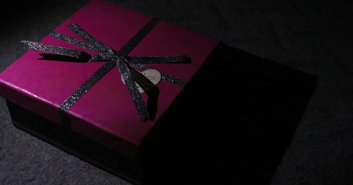 Luxury gift box with layered reveal structure, magnetic closure, and foil-stamped branding